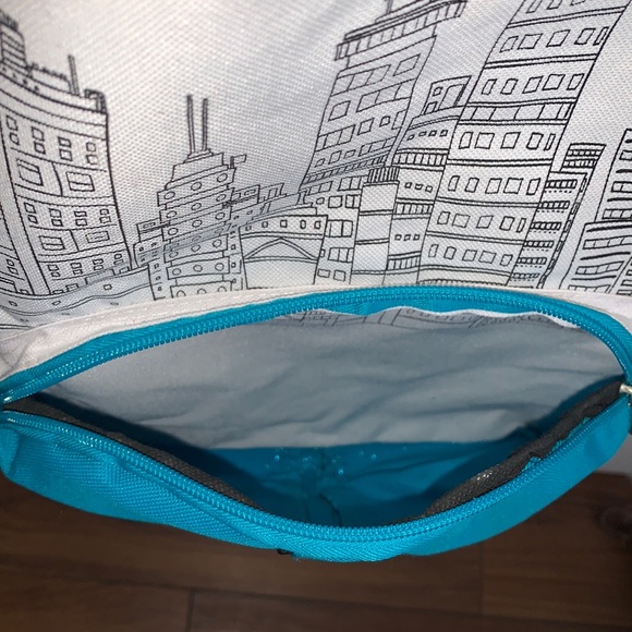 3/$50 Cyan Backpack with City Design - Picture 3 of 5